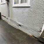 Concrete spalling before Foundation Wall Repair